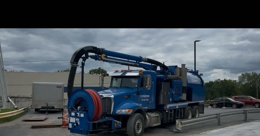 Crown Hydrovac vacuum truck staged at an industrial facility